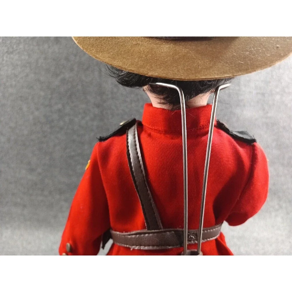 RCMP Country Canadian Mountie Porcelain Doll With Wood Based Stand